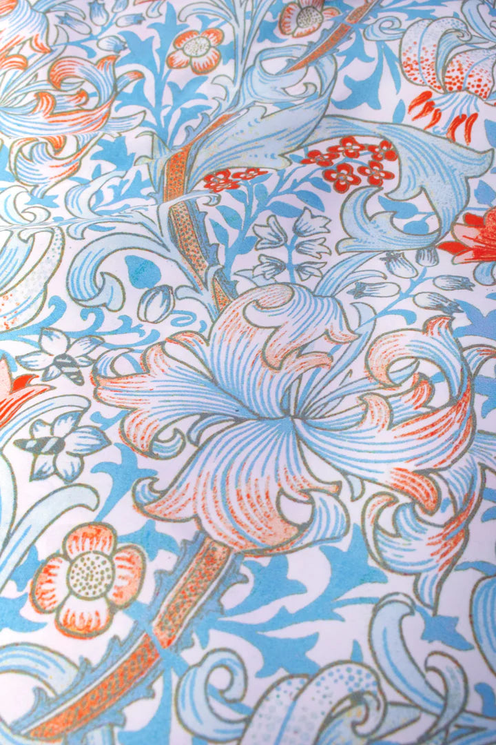 Close-up of William Morris Golden Lily design on a Kind Bags by Cornucopia Home and Gift, showcasing floral pattern and craftsmanship.