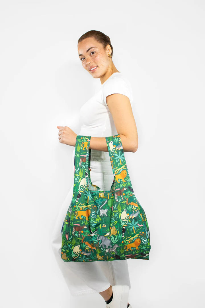 Bodil Jane Wildlife tote bag by Cornucopia Home and Gift featuring nature-inspired design held by a person.