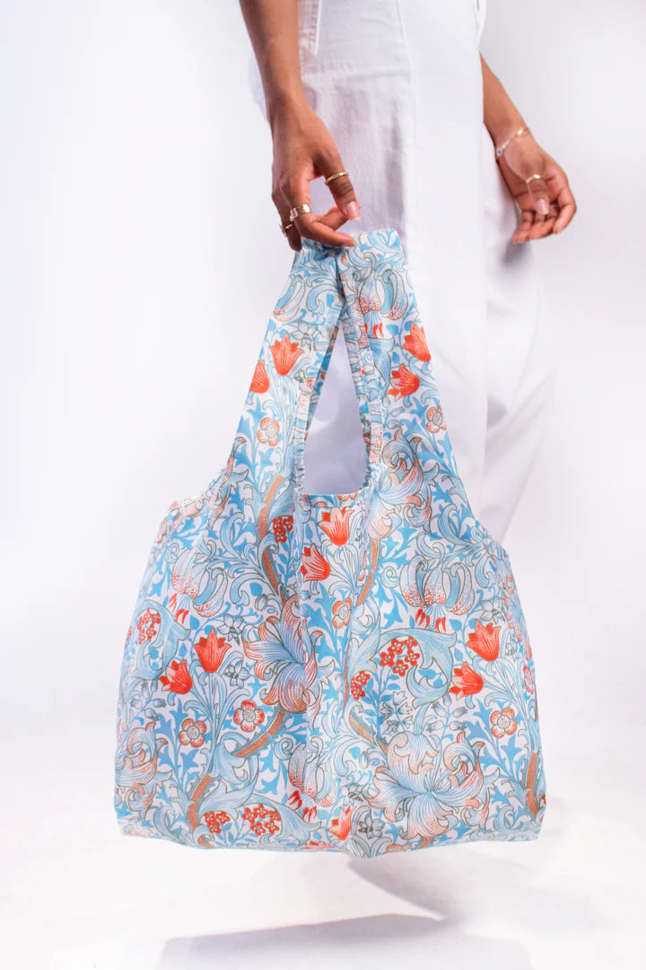 Close-up of William Morris Golden Lily design on a Corunucopia Home and Gift Kind Bag, showcasing intricate floral patterns and rich colors.