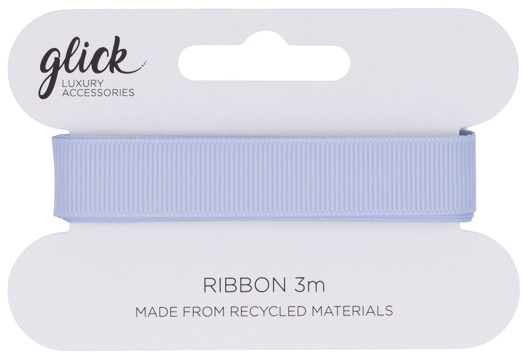 Baby blue Glick 3m ribbon from Cornucopia Home and Gift, neatly rolled with a soft, silky texture perfect for gift wrapping or crafts.