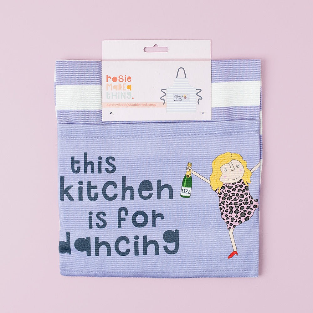 Rosie Made a Thing Kitchen Dancing Apron with colorful print, tied waist, and adjustable neck strap, designed for cooking and baking.