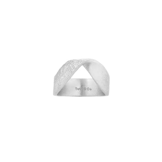 Silver Praise Ring by Tutti & Co featuring intricate design, displayed on a neutral background.