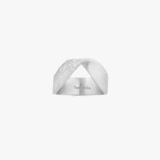 Silver Praise Ring by Tutti &amp; Co featuring intricate design, displayed on a neutral background.