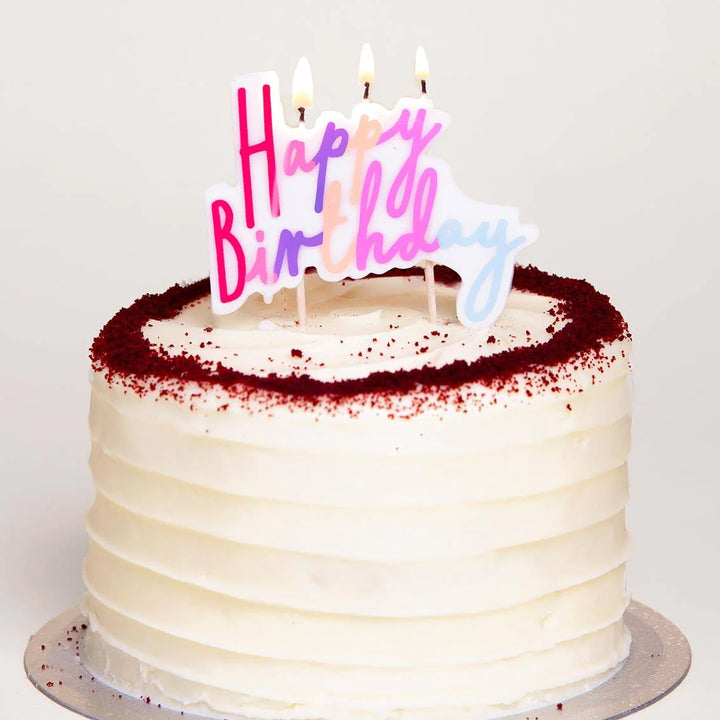 Large pink "Happy Birthday" candle from Talking Tables by Cornucopia Home and Gift, with detailed floral design and decorative elements