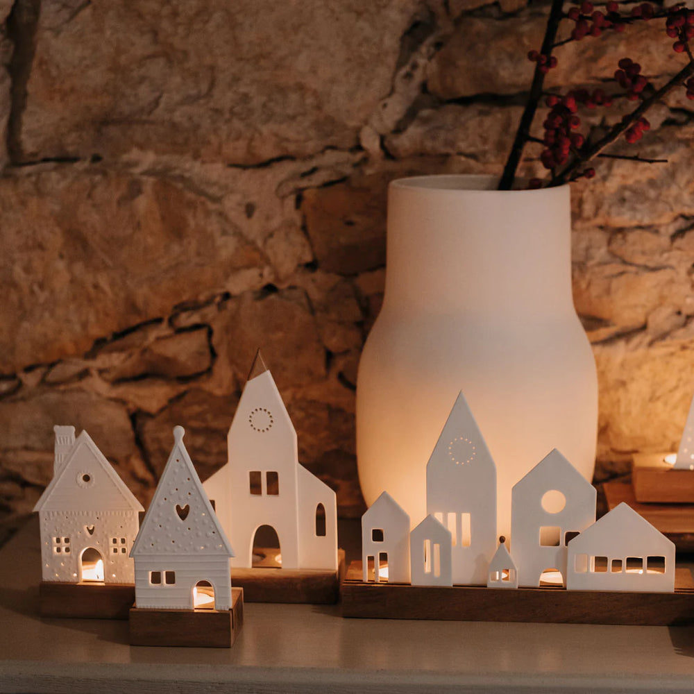 Radër light object gingerbread house by Cornucopia Home and Gift, white decorative house with detailed gingerbread design.