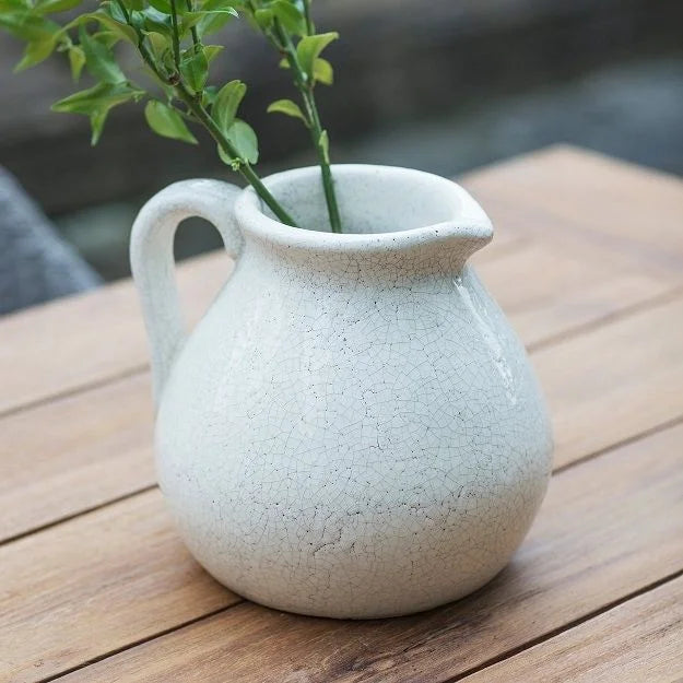 White Ravello flower jug by Garden Trading, featuring a classic ceramic design with floral detailing, ideal for garden or home decor.