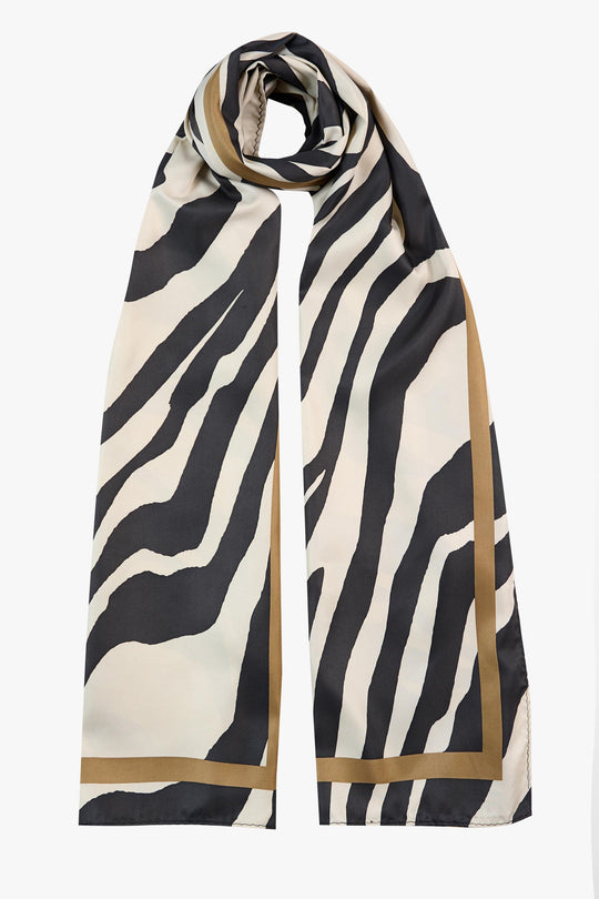 Colorful Adorn Scarf by Tutti &amp; Co, featuring soft fabric and vibrant patterns, perfect for stylish accessories.
