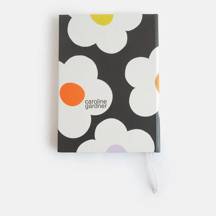 Caroline Gardner multi-flower design slim casebound notebook with charcoal cover, perfect for gifting or note-taking.