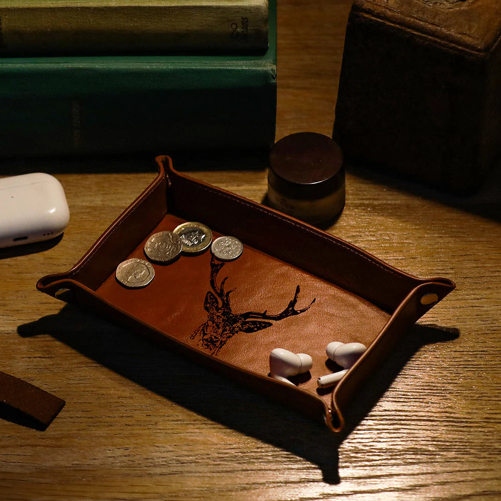 Selbrae House engraved leather stag trinket tray with detailed stag design, perfect for storing jewelry or small accessories.