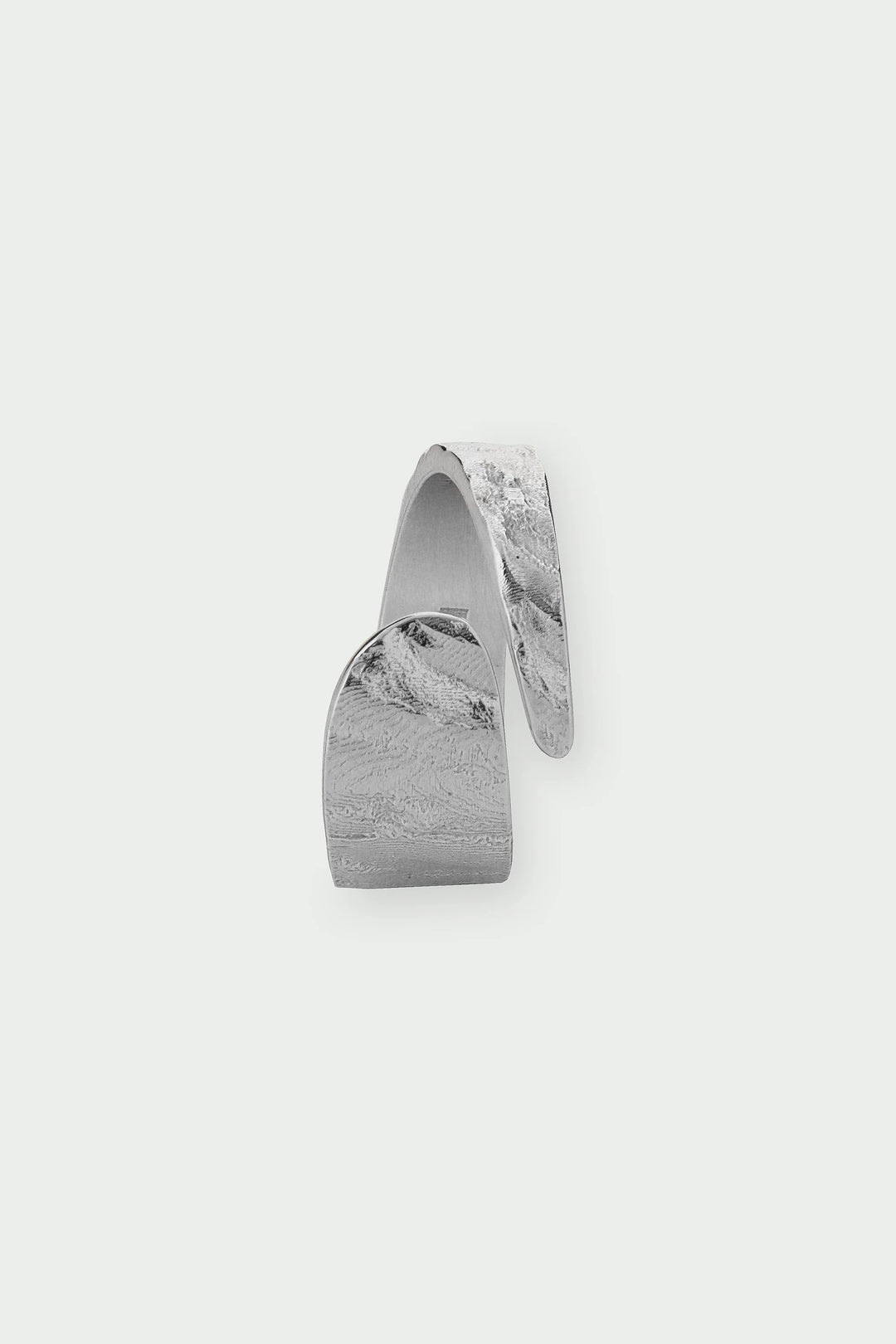Silver Riva Ring by Tutti &amp; Co, featuring a sleek, polished design with intricate detailing, displayed on a neutral background.