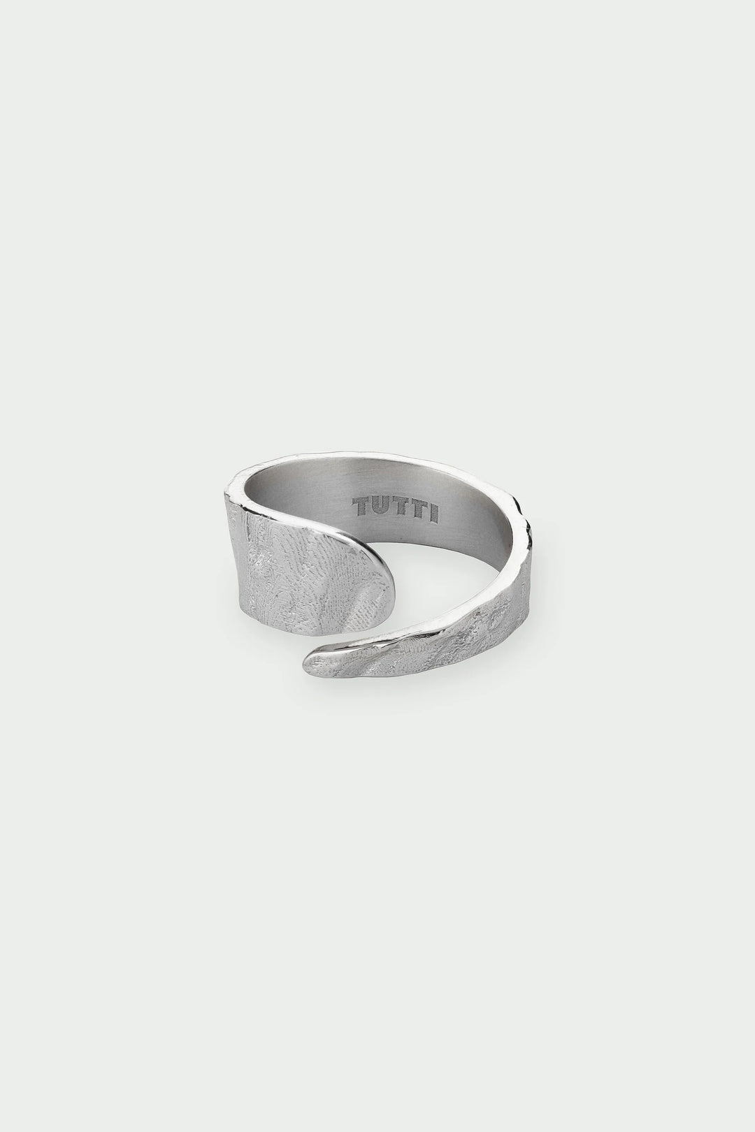 Silver Riva Ring by Tutti &amp; Co from Cornucopia Home and Gift, featuring a sleek, polished silver band with intricate detailing.