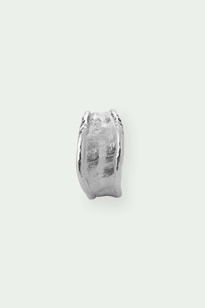 Silver Medium Driftline Ring by Tutti &amp; Co, featuring a sleek, modern design with a smooth, rounded silver band.