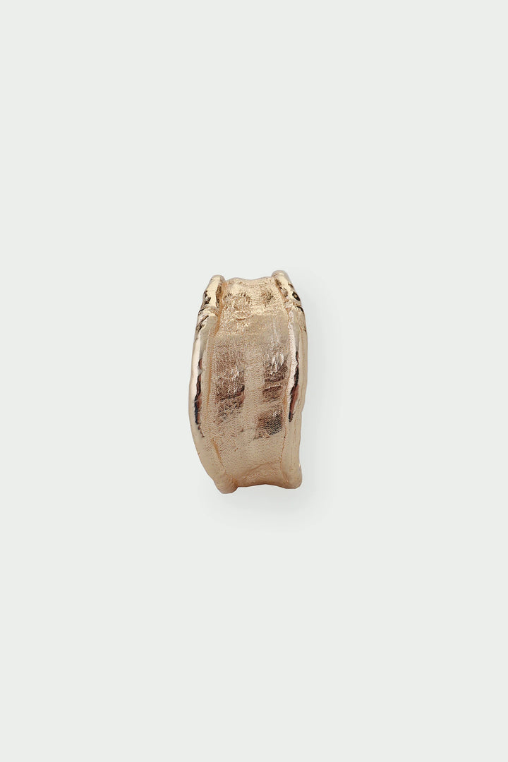 Medium gold Driftline ring by Tutti &amp; Co, featuring a sleek, modern design, shown on a neutral background.