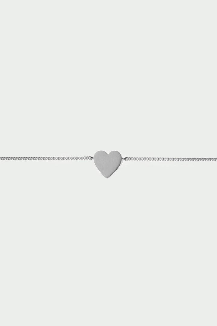 Silver Spirit bracelet from Tutti &amp; Co featuring intricate design, displayed on a neutral background