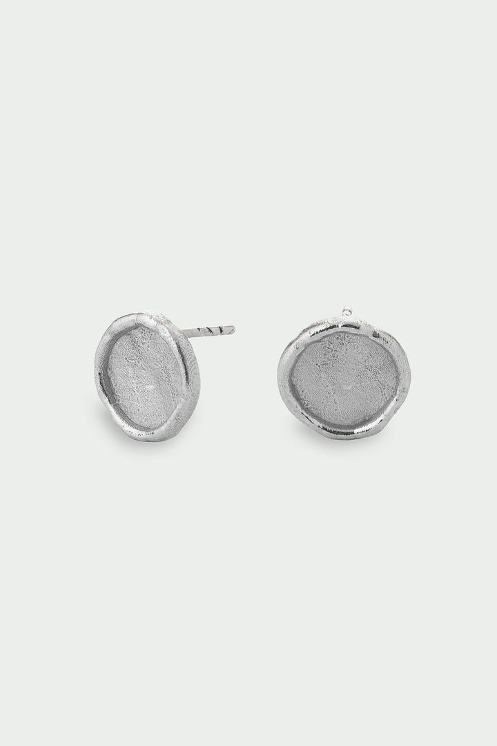 Silver Arc Earrings from Tutti &amp; Co featuring sleek, minimalist design with polished silver finish.