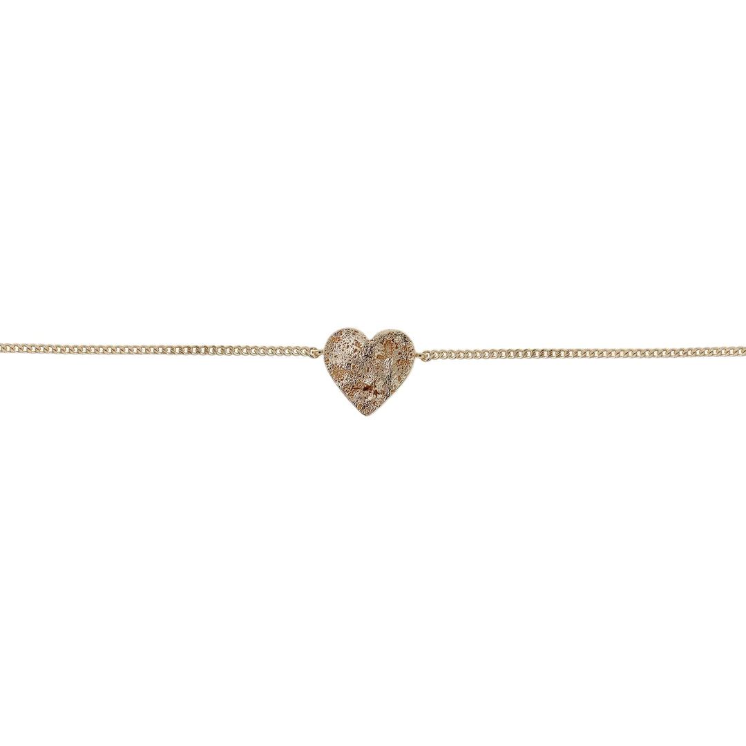 Gold Spirit Bracelet by Tutti & Co featuring intricate design, displayed on a neutral background with soft lighting.