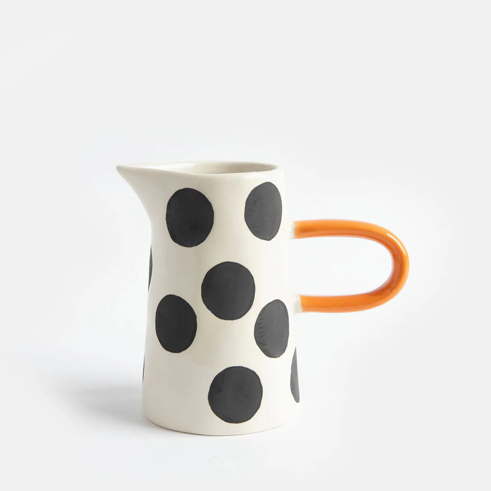 Caroline Gardner Mono Spot small ceramic jug with handle, ideal as a gift, featuring a cheerful spotted design.