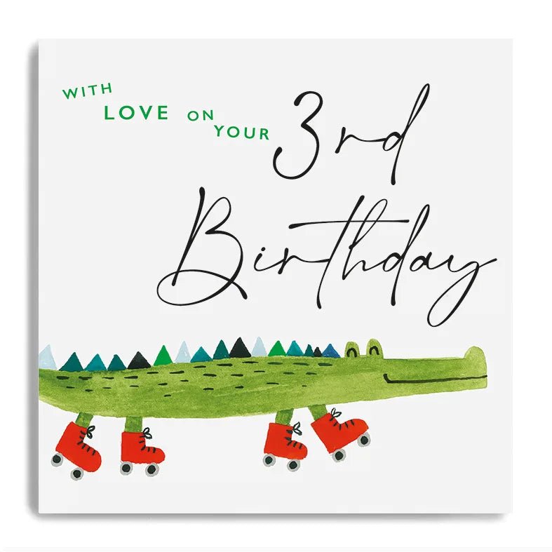 Colorful Happy 3rd Birthday Crocodile card by Janie Wilson for Cornucopia Home and Gift, featuring a playful crocodile illustration.