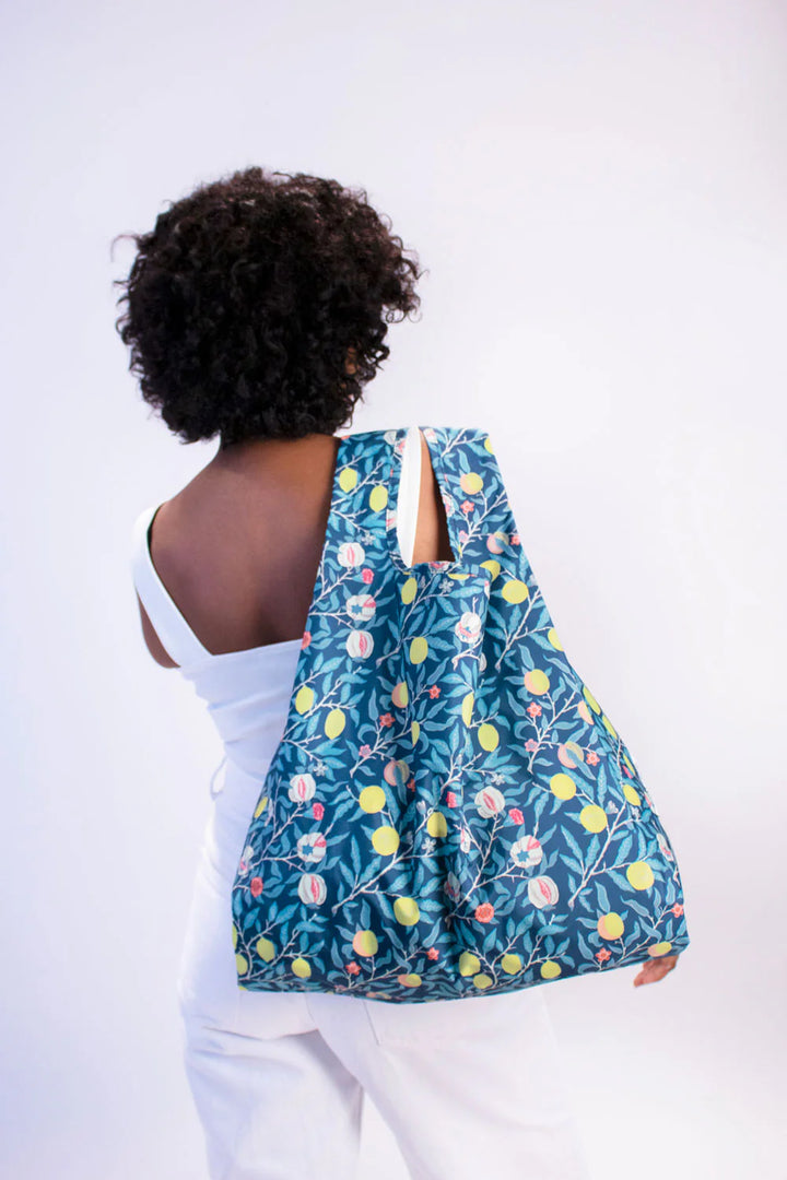 William Morris Fruit design Kind Bag by Cornucopia Home and Gift featuring a colorful fruit pattern on a shoulder bag.