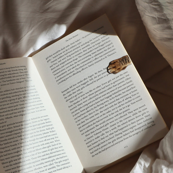 Kikkerland Cat Paw Bookmarks featuring adorable paw print design, perfect for marking pages in books.
