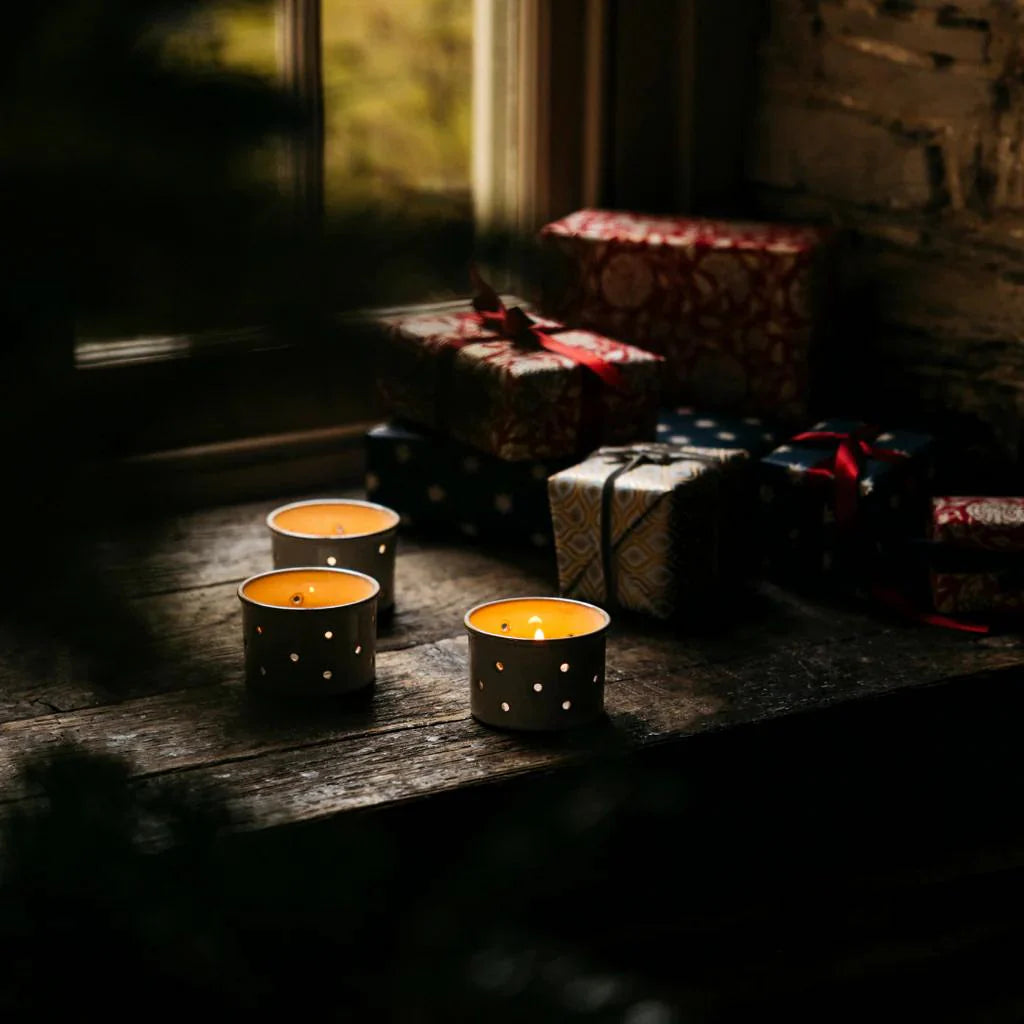 Set of three St Eval Sacred Forest tealights in glass holders, perfect for creating a warm Christmas ambiance.