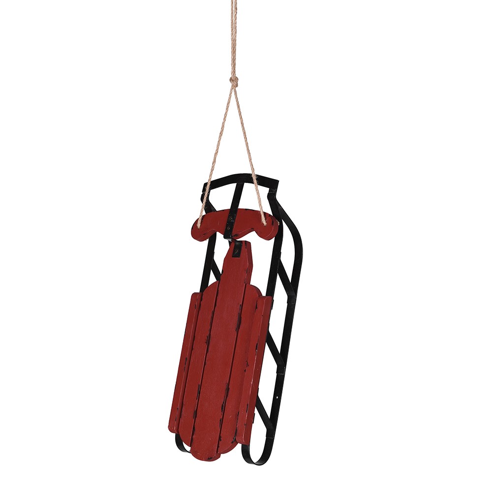 Rustic red coach house Christmas sledge by Cornucopia Home and Gift, featuring wooden construction and festive holiday design.