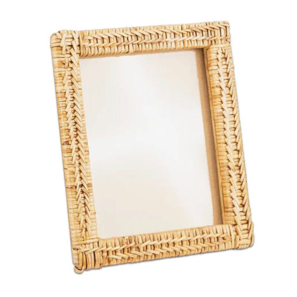 Nkuku rattan photo frame with a natural woven design, perfect for displaying photos in a stylish, rustic home decor setting.