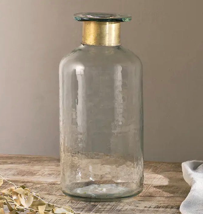 Large Nkuku Chara hammered bottle vase with a textured finish and narrow neck, perfect for modern floral arrangements.
