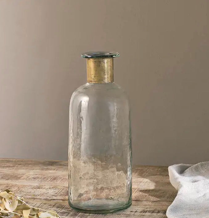 Nkuku Chara hammered small bottle vase with textured metal finish, ideal for flower arrangements or decorative displays.