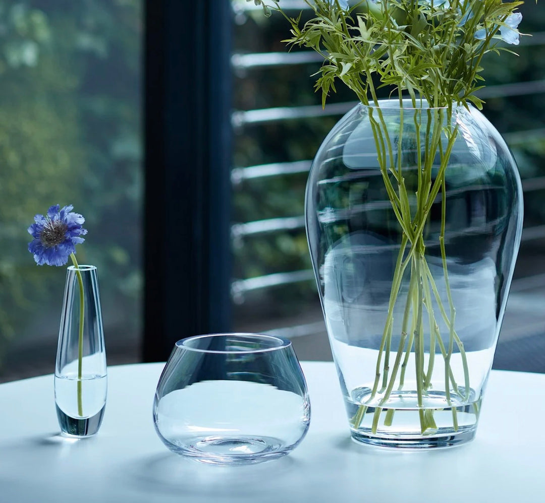 Clear glass flower single stem vase by LSA International, 17cm tall, showcasing smooth, transparent design for floral displays.