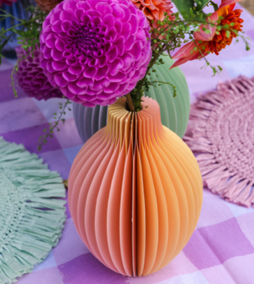 Yellow and orange ombre honeycomb paper bud vase by Cornucopia Home and Gift, featuring a textured, decorative floral vase design.