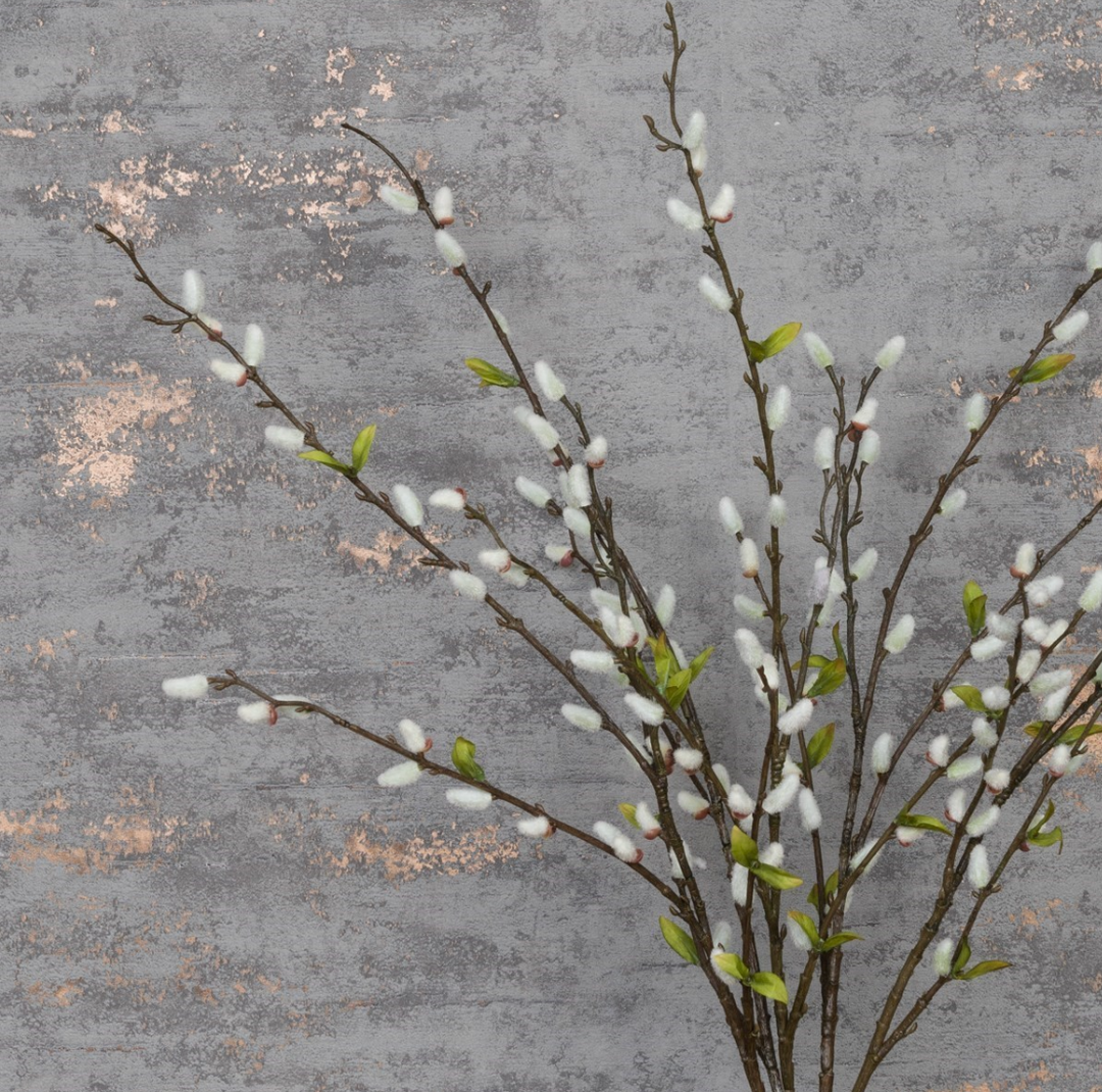 Cream-colored faux pussy willow stem from Floralsilk by Cornucopia Home and Gift, with soft catkin buds on a natural branch.