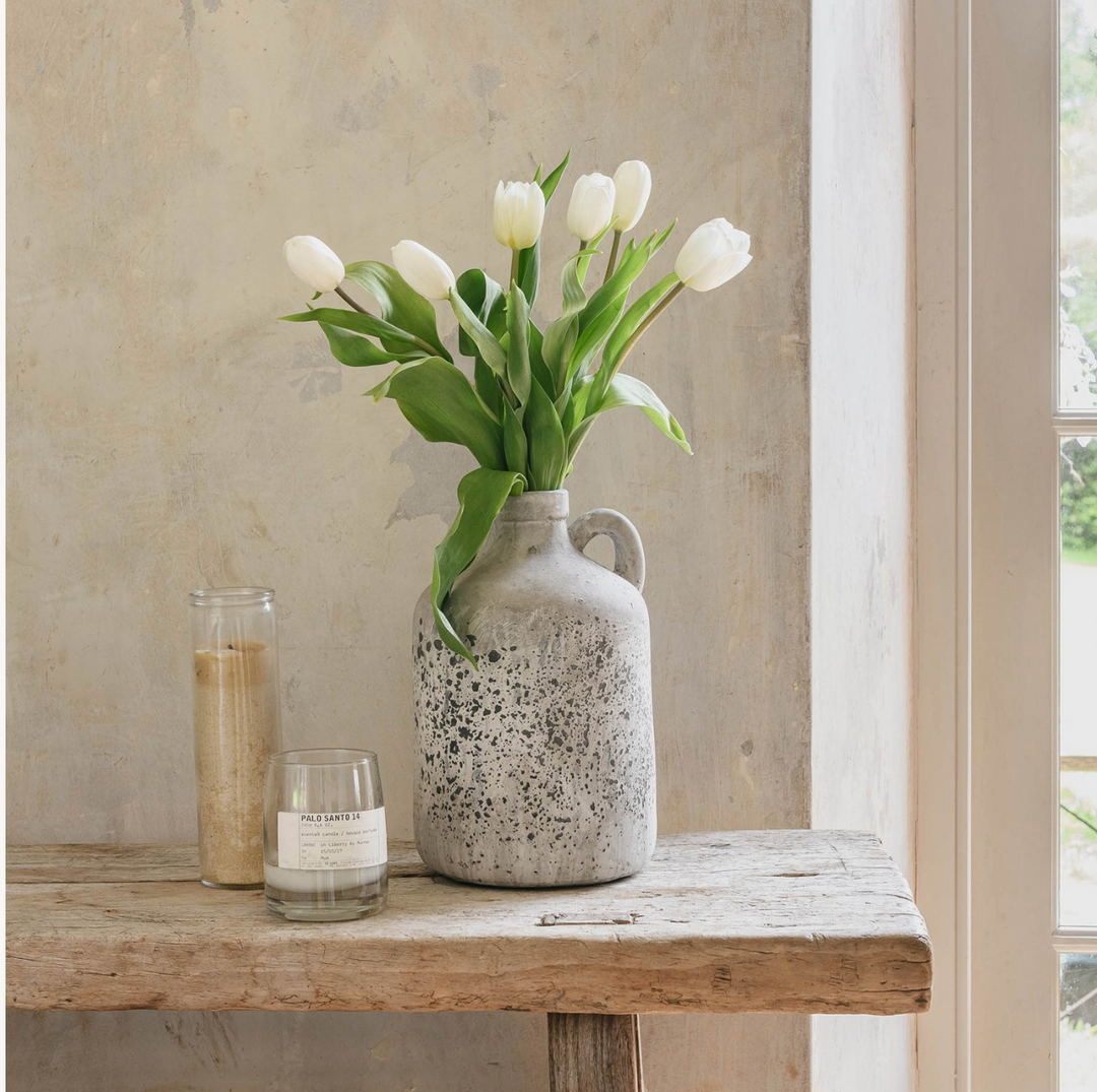 Decorative stone jug by Cornucopia Home and Gift, featuring a textured surface and classic shape for home decor.