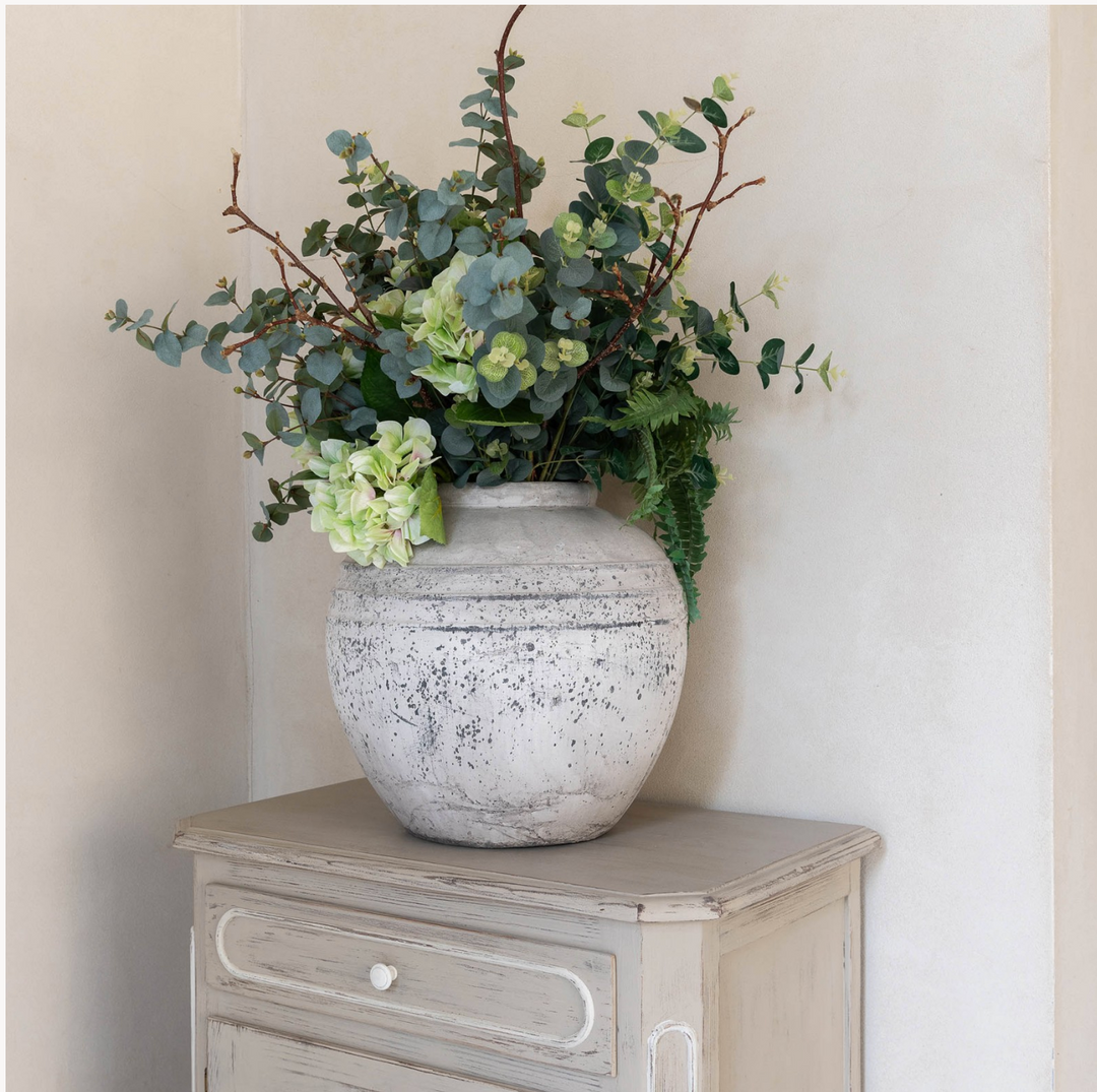 Round Birkdale stone pot by Cornucopia Home and Gift, featuring a smooth, rounded design perfect for home decor and plant displays.