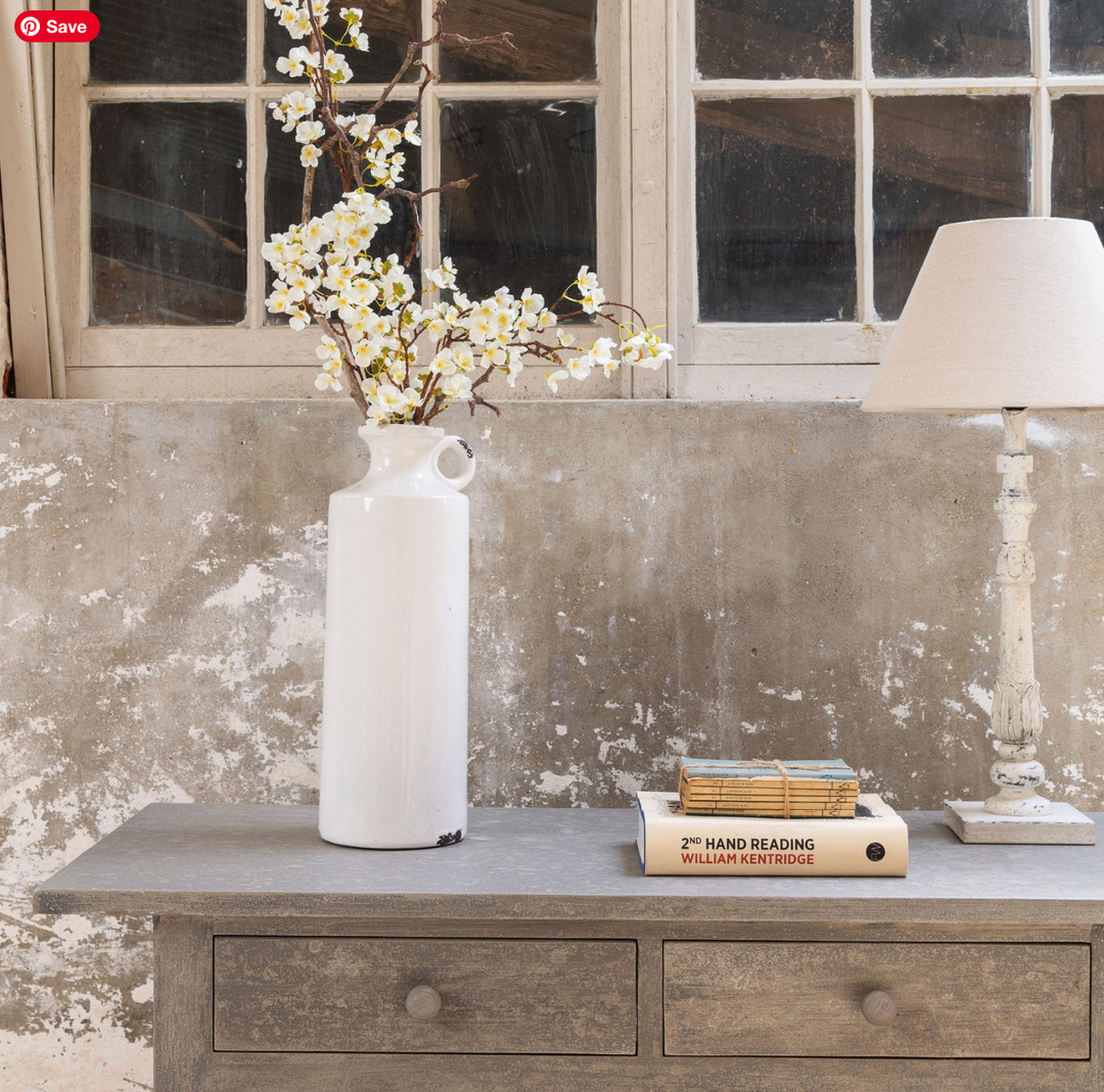 Tall stone jug from Stanford Tall collection by Cornucopia Home and Gift, featuring a rustic ceramic design with a handle.