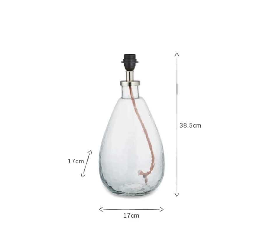 Small tall clear Baba glass lamp by Nkuku, with a sleek, transparent design perfect for modern home decor.