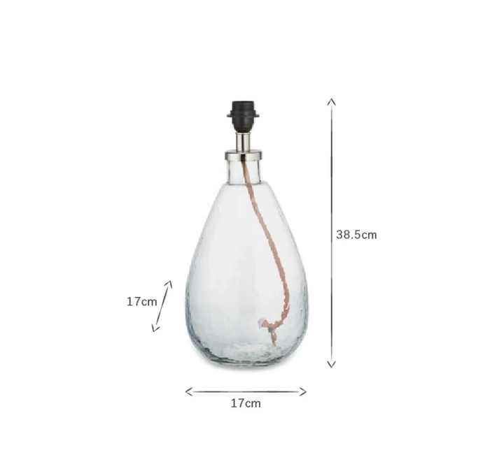 Small tall clear Baba glass lamp by Nkuku, with a sleek, transparent design perfect for modern home decor.