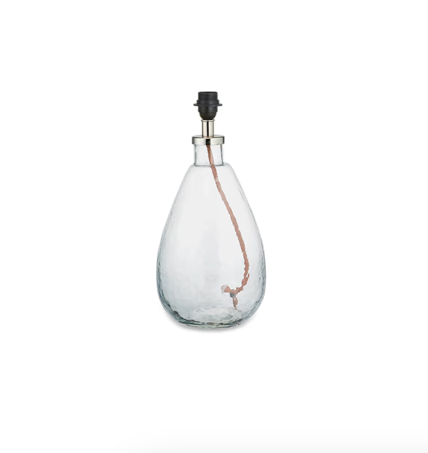 Small tall clear Baba glass lamp by Nkuku featuring a sleek, transparent design ideal for modern home decor.