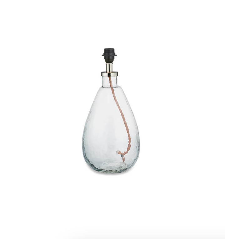 Small tall clear Baba glass lamp by Nkuku featuring a sleek, transparent design ideal for modern home decor.