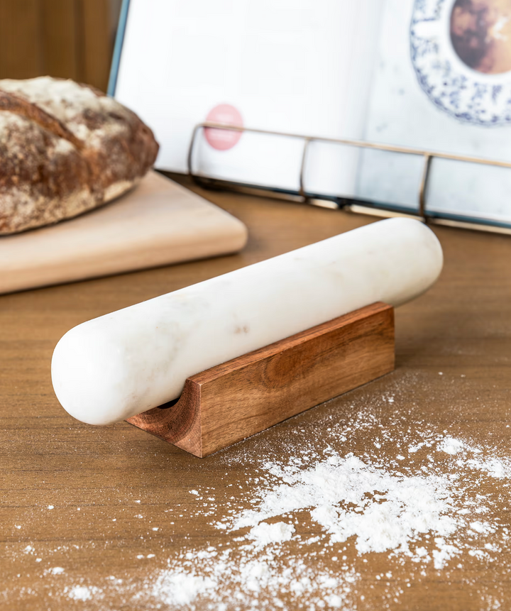 White Brompton rolling pin by Garden Trading, featuring a sleek wooden handle and smooth cylindrical surface for baking or kitchen use.