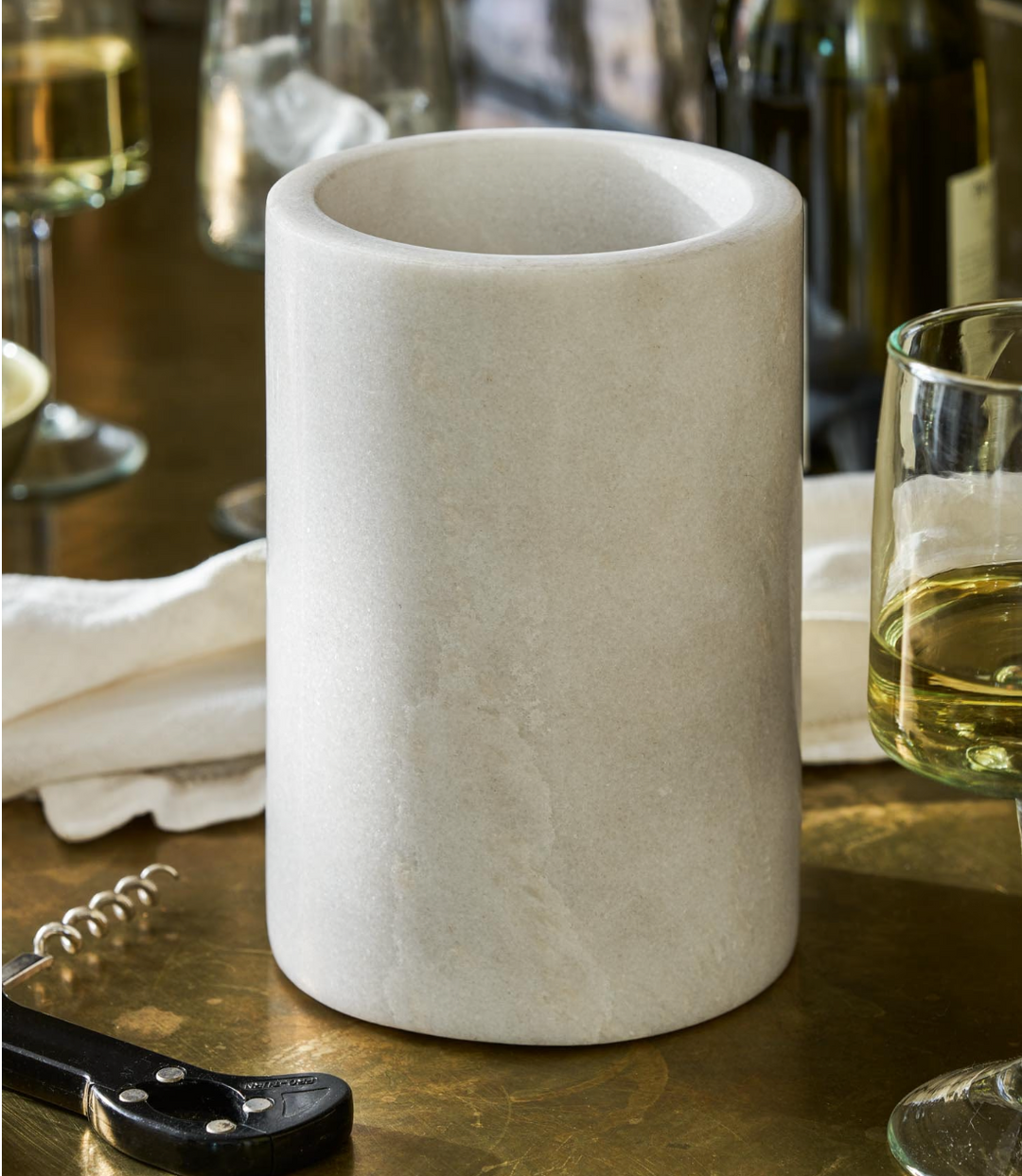 Marble wine cooler in garden style with a sleek, modern design from Cornucopia Home and Gift, perfect for outdoor entertaining.