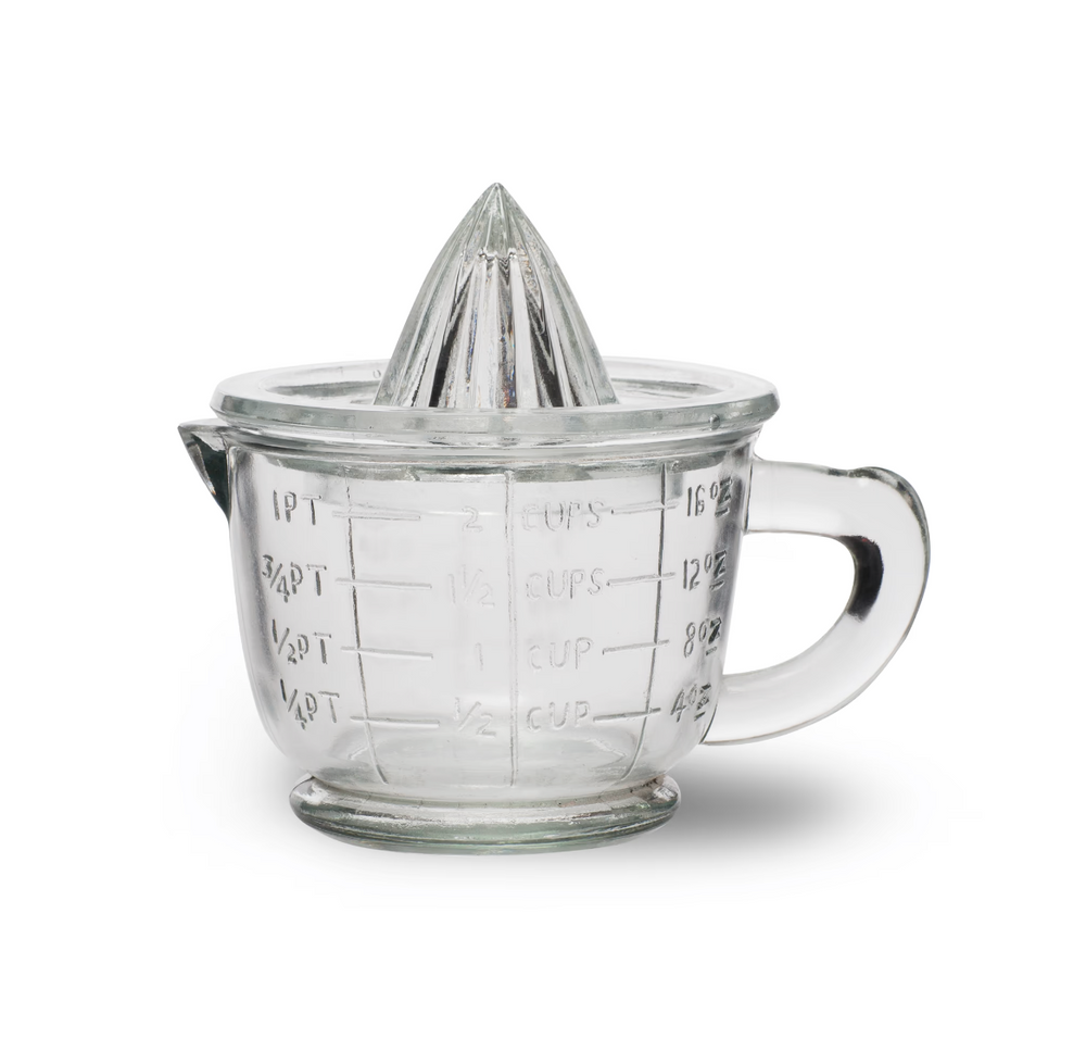 Garden Trading Classic Glass Juicer with sturdy handle and clear glass construction for efficient citrus juice extraction.
