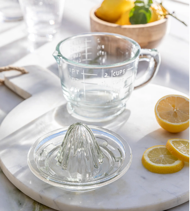 Garden Trading Classic Glass Juicer with a clear glass body and metal handle for efficient citrus juice extraction.