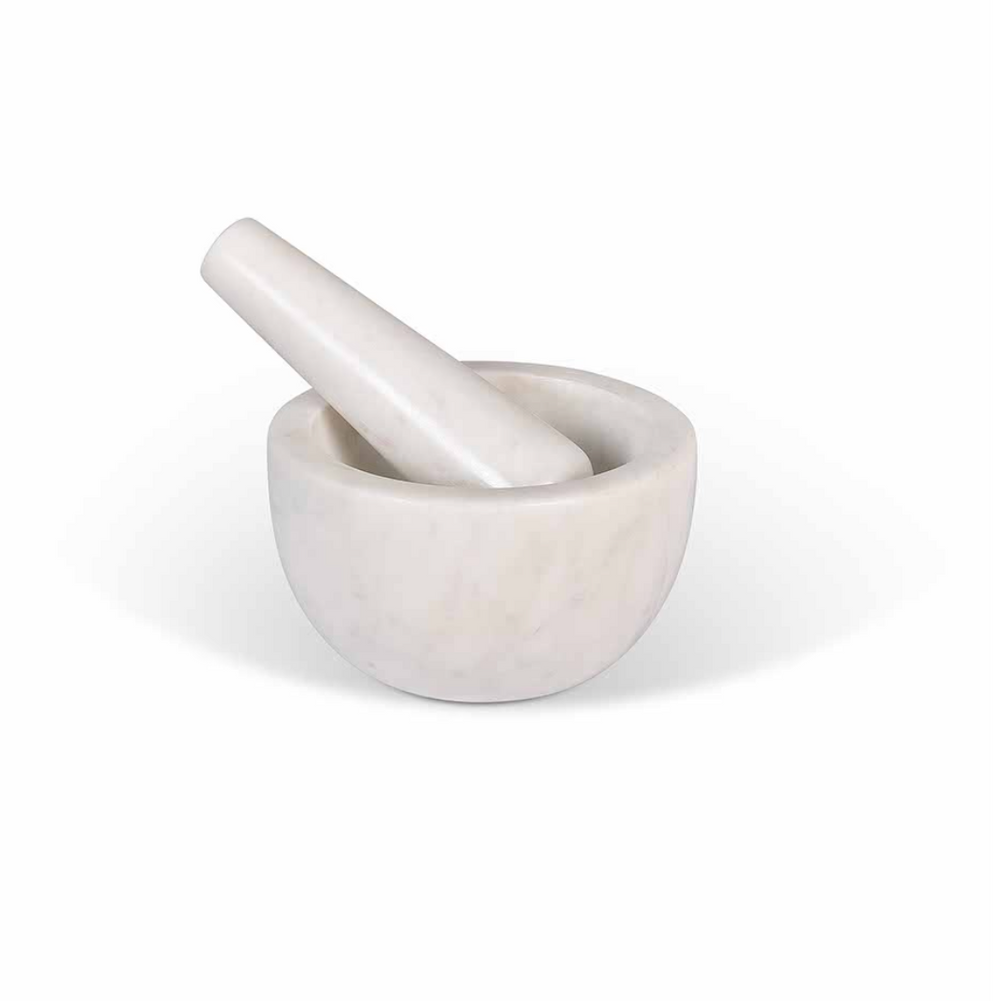 White Brompton pestle and mortar by Garden Trading, ideal for grinding herbs and spices in a stylish kitchen or garden setting.