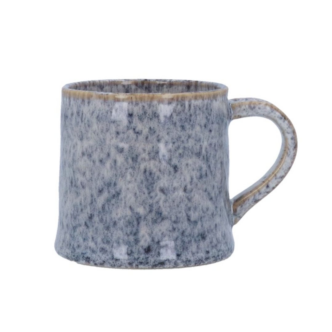 Speckled blue mug on a white background