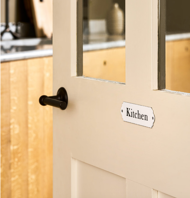 White enamel kitchen sign by Garden Trading, with classic design, perfect for adding charm to your kitchen decor.