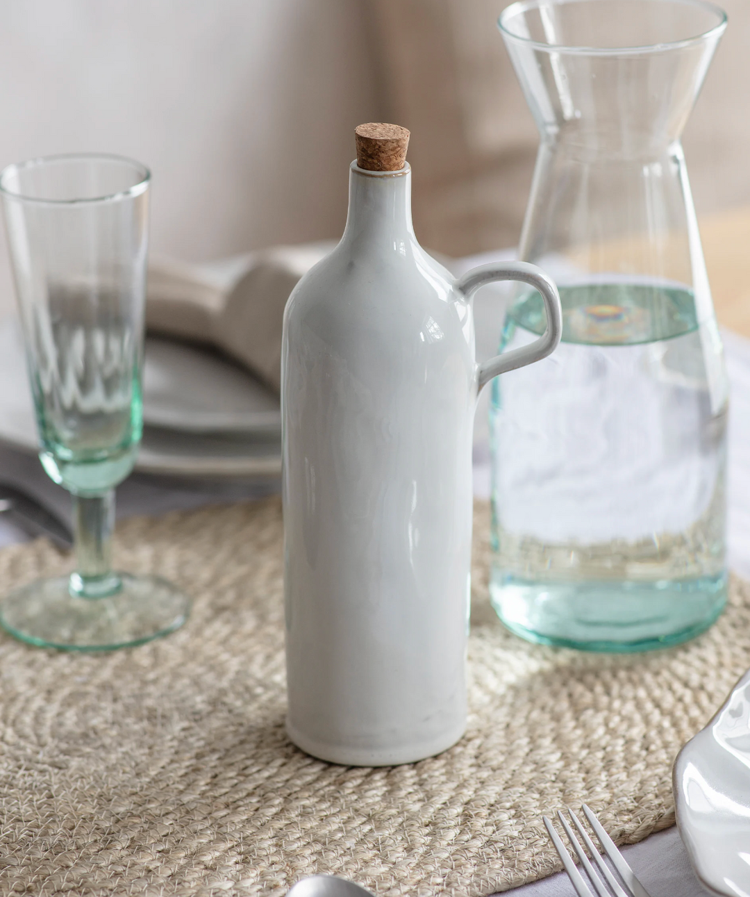 White Ithaca oil bottle from Garden Trading by Cornucopia Home and Gift, featuring a sleek, minimalist design for kitchen or garden use.