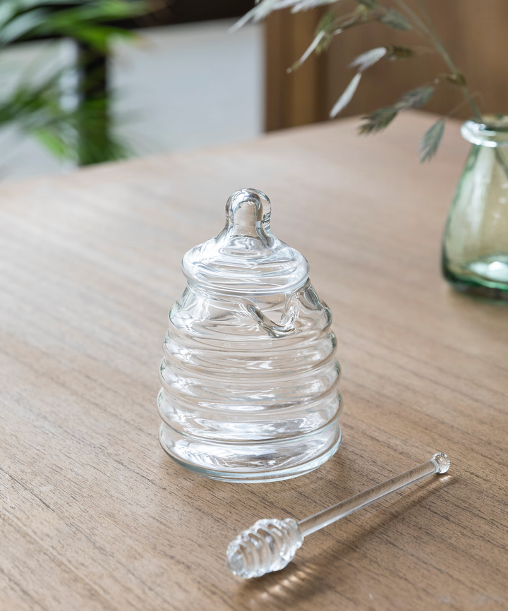 Glass Murcot honey pot by Garden Trading with a classic design, ideal for storing honey in a stylish kitchen or garden setting.