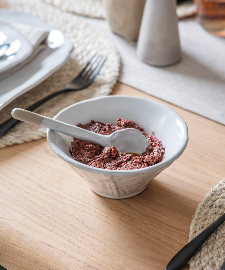 White Ithaca Meze Bowl with spoon by Garden Trading, perfect for serving small dishes in a stylish kitchen setting.