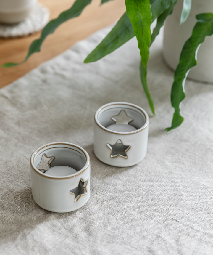 Pair of white Ithaca tealight holders by Garden Trading, designed for decorative use in home or garden settings.